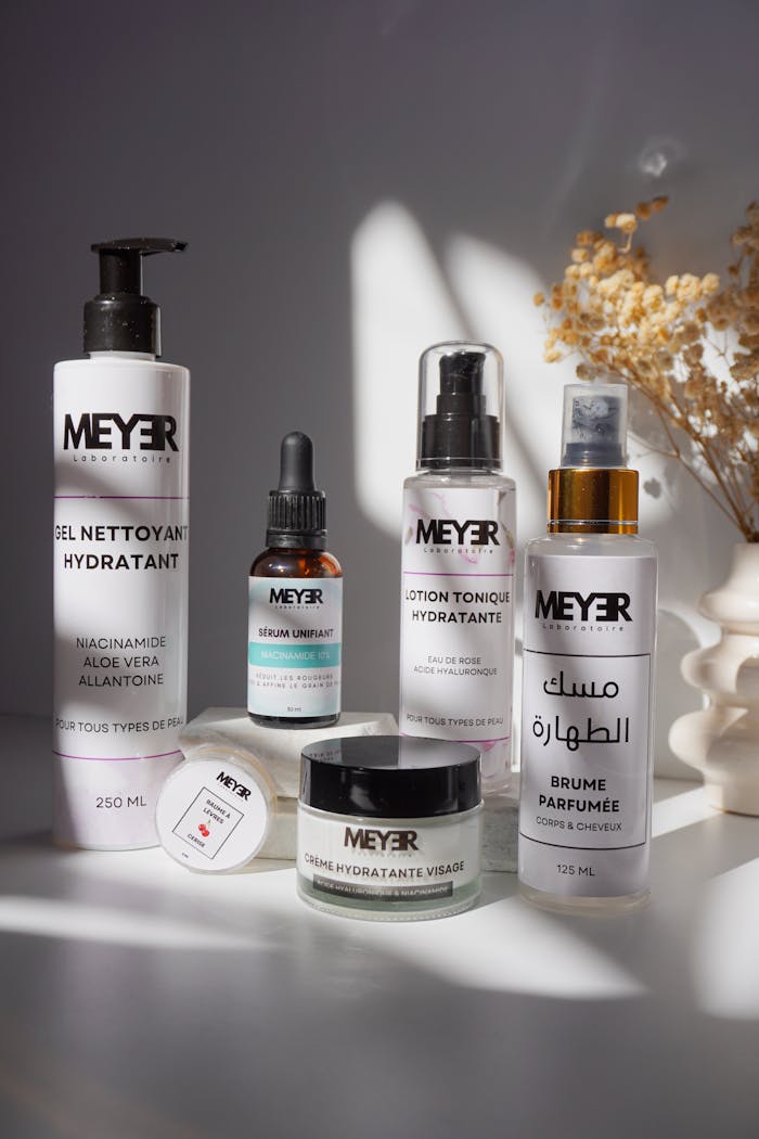 get-in-touch Elegant Meyer skincare product set with dried flowers in natural lighting